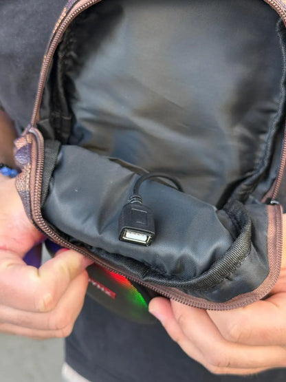 SlingBeat™ – Bandolera con Parlante Bluetooth